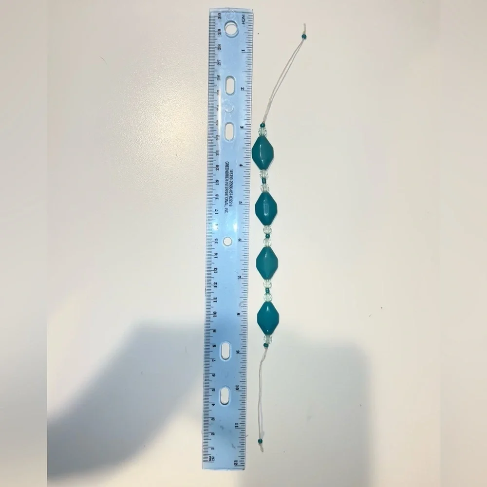 Handmade teal beaded bracelet tie on